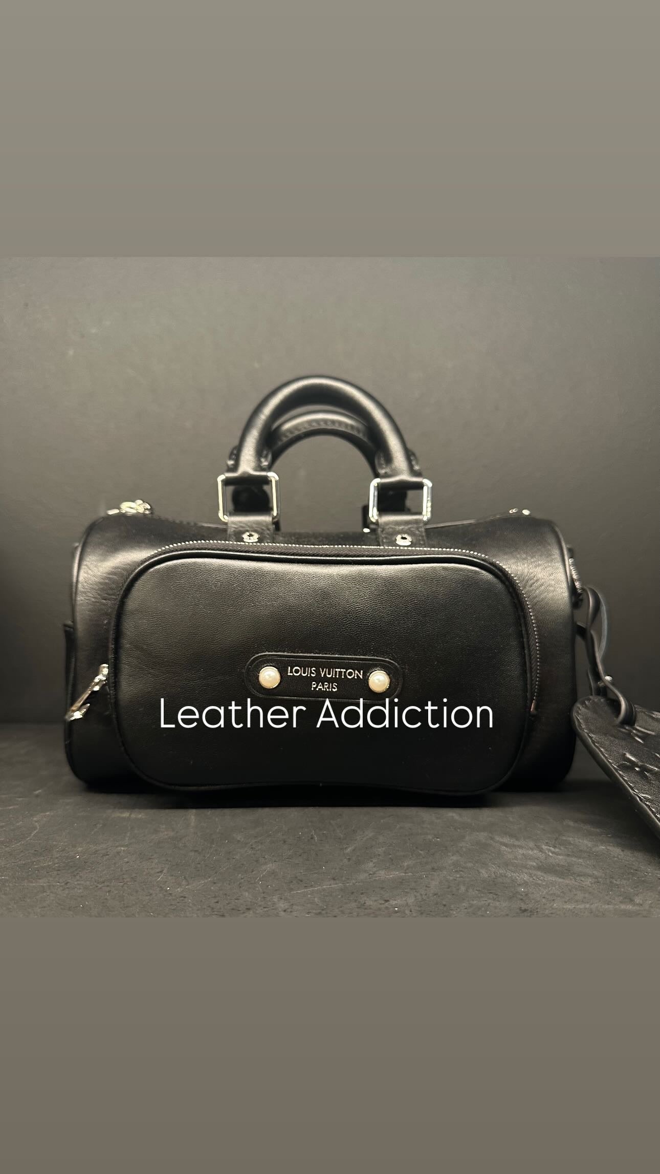 Louis Vuitton keepal cargo boundouliere 25cm